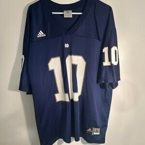 Navy and white adidas notre